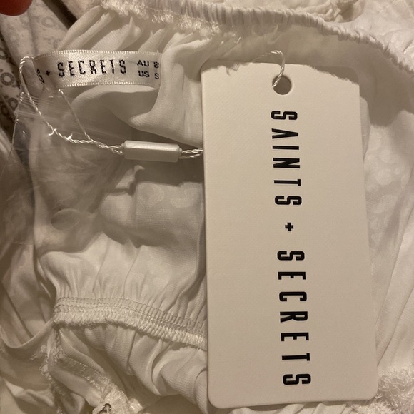 New with tags! Has a super subtle cheetah print (white on white). - Picture 3 of 3